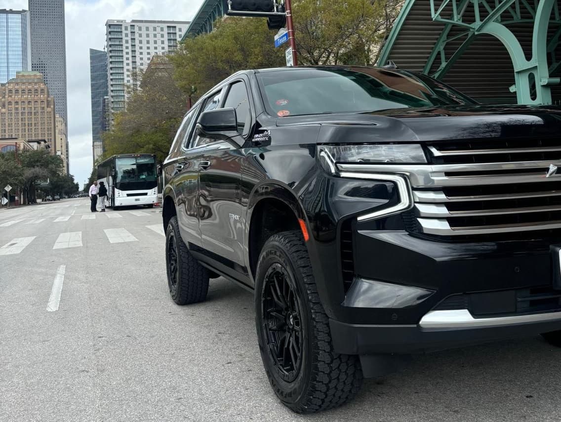 Chauffeur with luxury vehicle